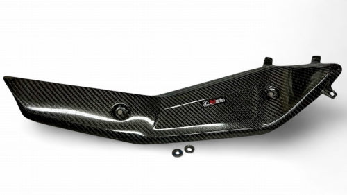 Carbon fiber exhaust guard for Husqvarna 701 motorcycle, featuring a sleek black design with a Wolfcarbon logo.
